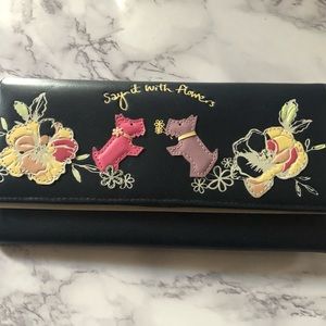 Radley London-Say it with Flowers large Flap over Wallet. 4 1/8”L x 7-2/3”W x 1D